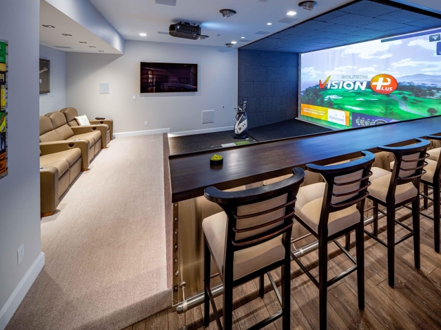 Basement bar with virtual driving range