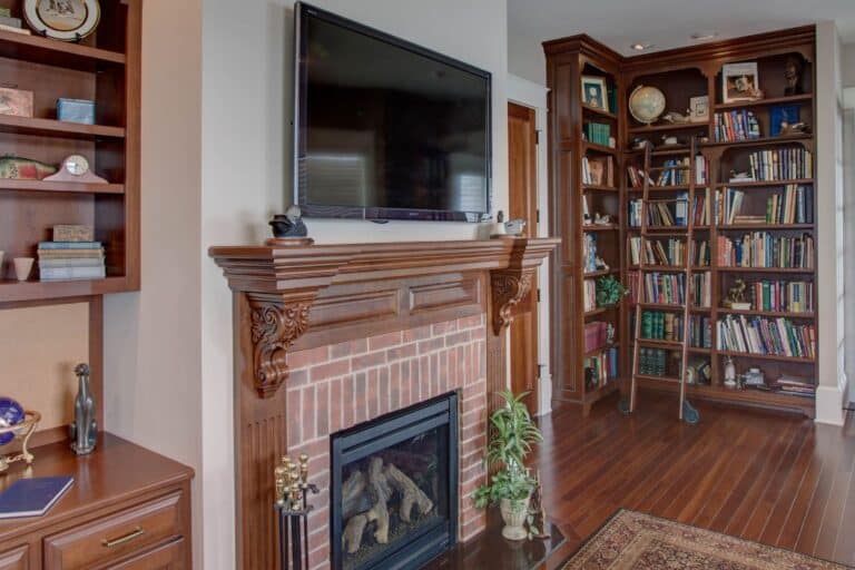 Book shelves, fireplace, and tv Custom Cabinetry in Diamond Lake MI