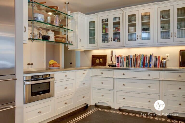 View of custom kitchen cabinets, glass cabinets, and shelves in South Bend IN