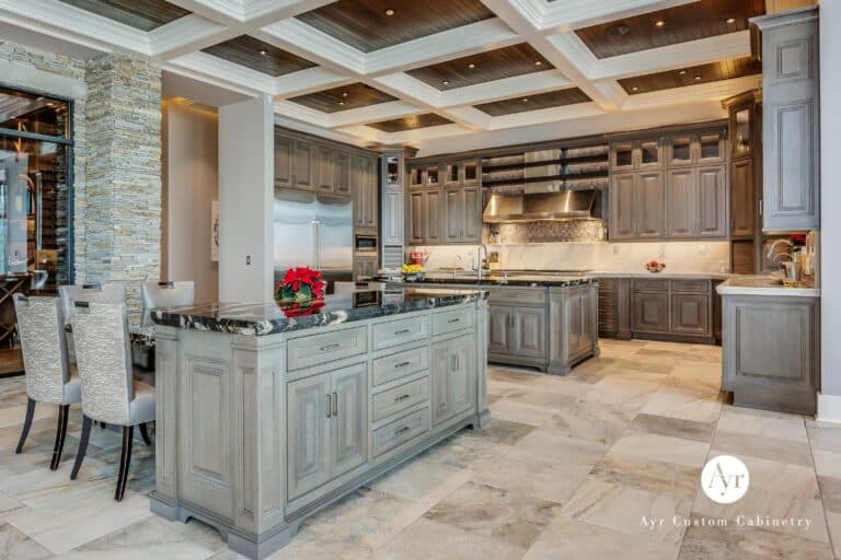 view of custom kitchen cabinets in Stevensville MI with island seating area and storage