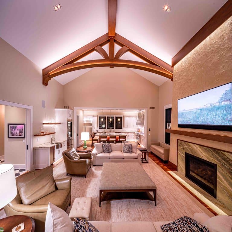 Wooden trusses on a vaulted ceiling in living room