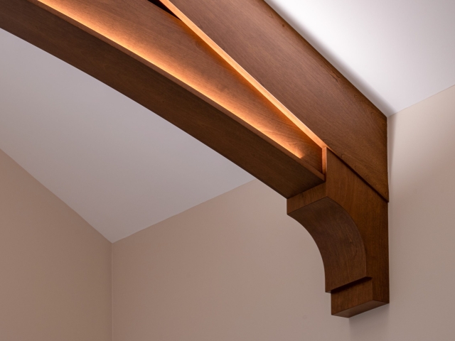 Wooden trusses on a vaulted ceiling