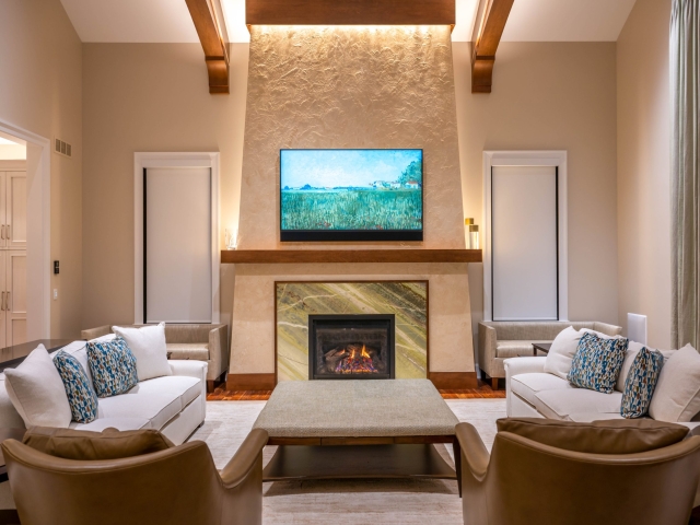 Wooden trusses on a vaulted ceiling in living room