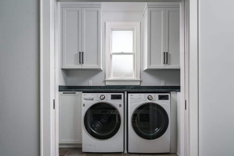 white laundry room cabinets