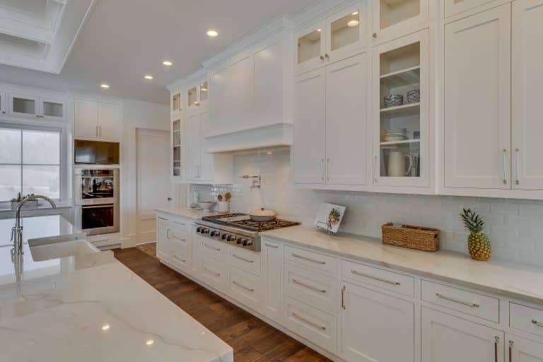 beautiful stove hood in custom kitchen cabinets in middlebury in