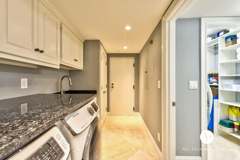 beautiful laundry room custom cabinets