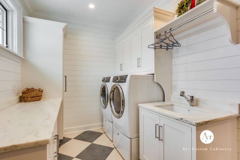 custom white laundry room cabinets