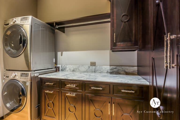 laundry room with upright appliances